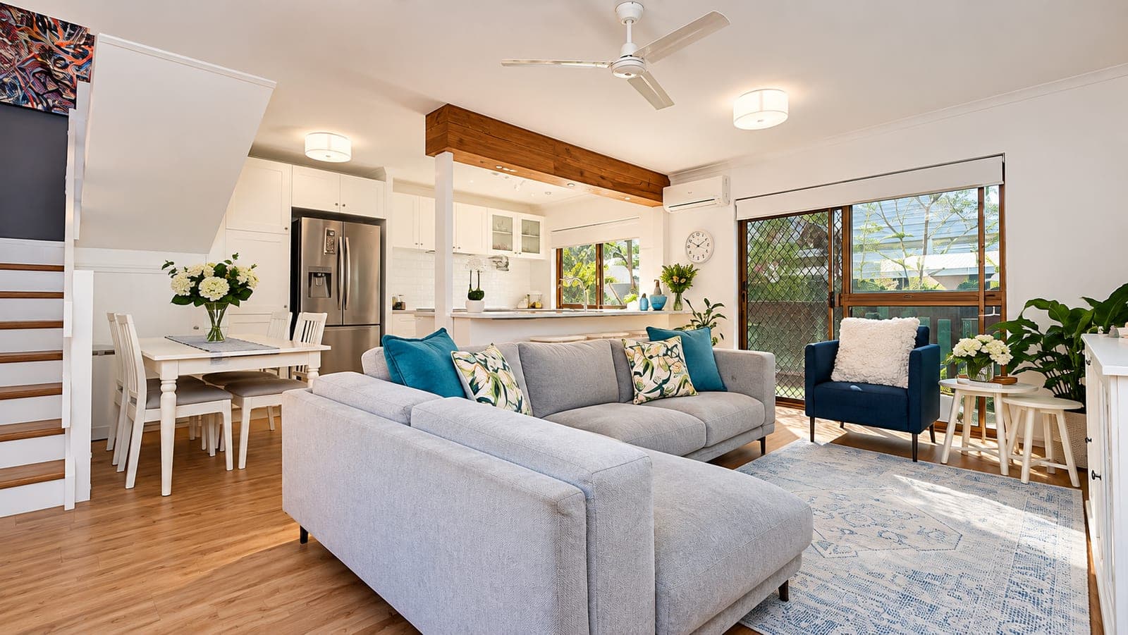 Open-plan living and kitchen space created by a load-bearing wall removal